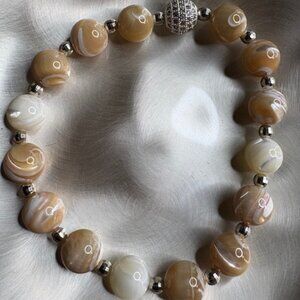 combination of natural stone beauty and metallic shimmer